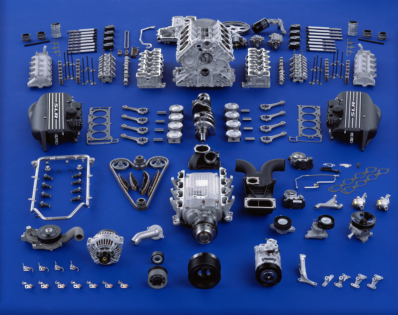 Disassembled car engine components