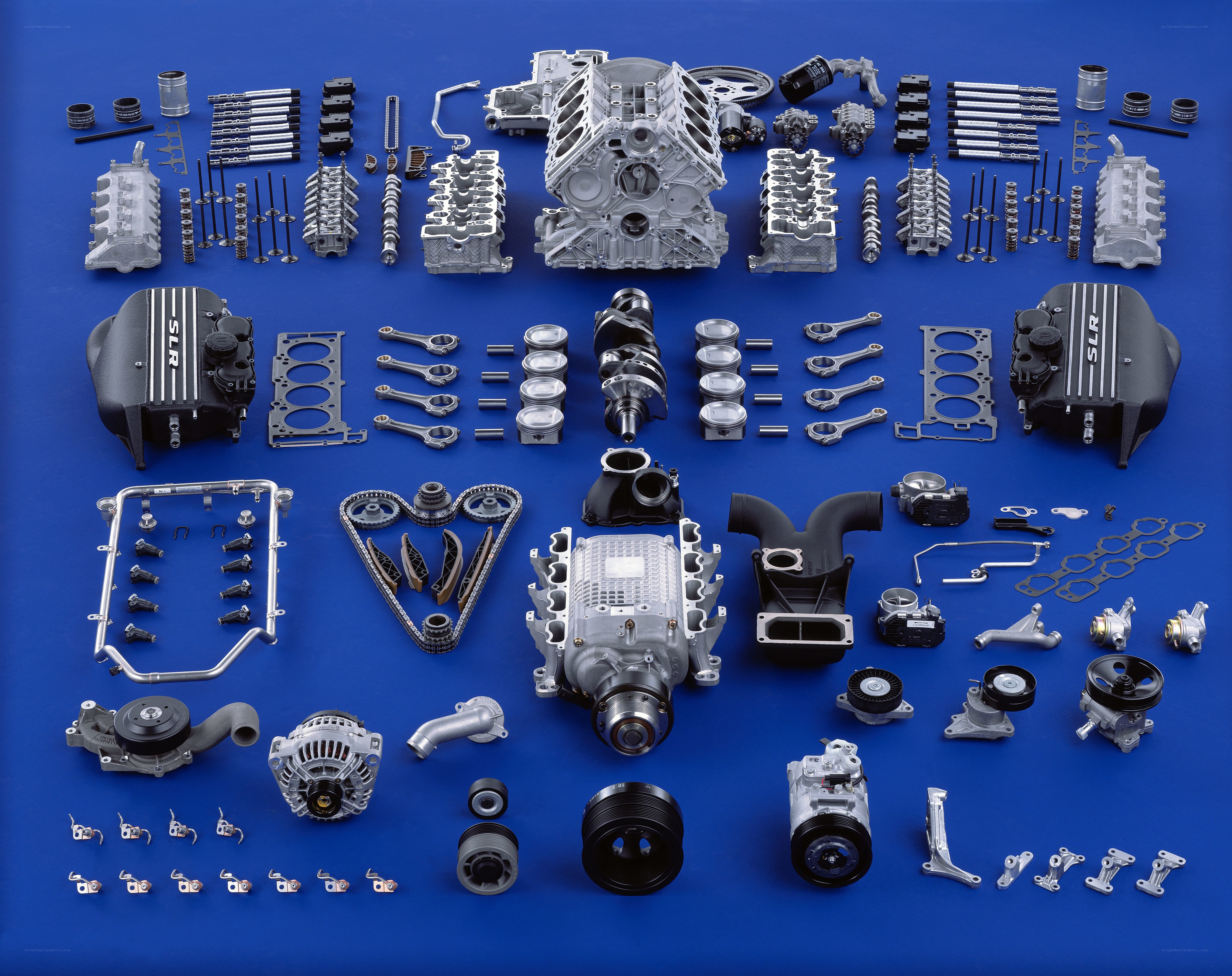 Disassembled car engine components