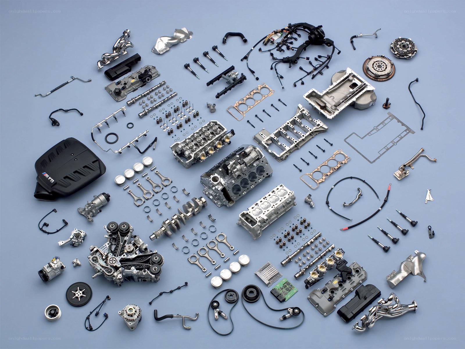 Disassembled car engine parts