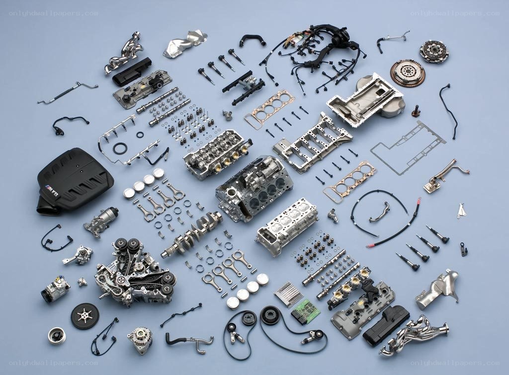 disassembled car engine parts