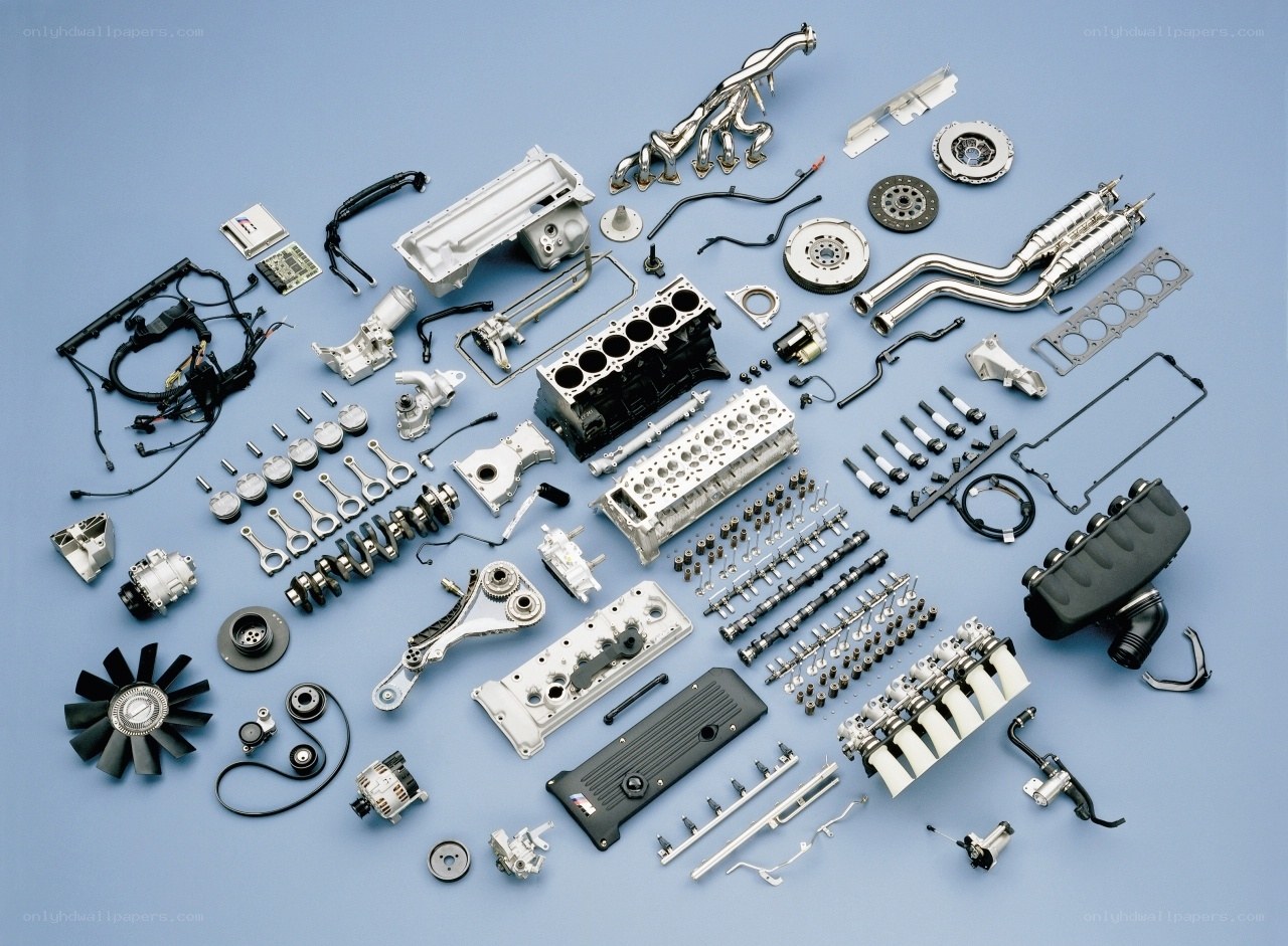 Disassembled car engine parts