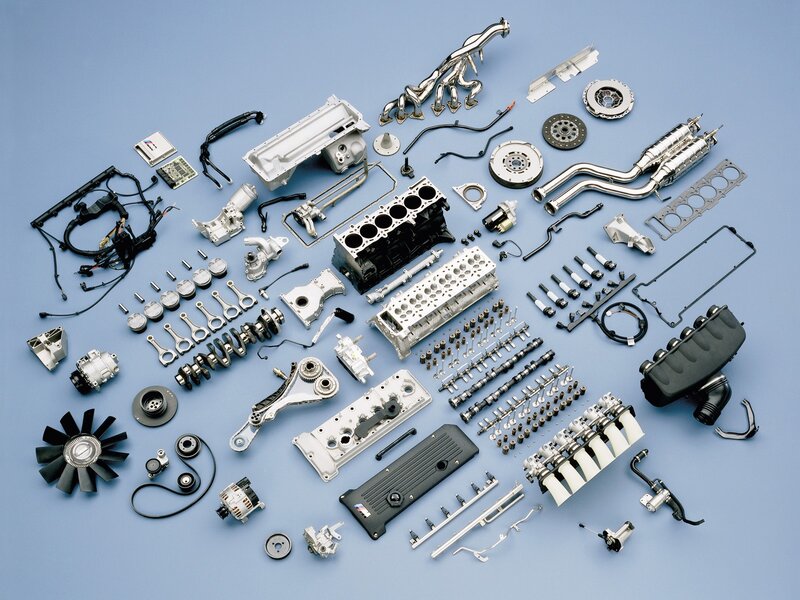 Disassembled car engine parts