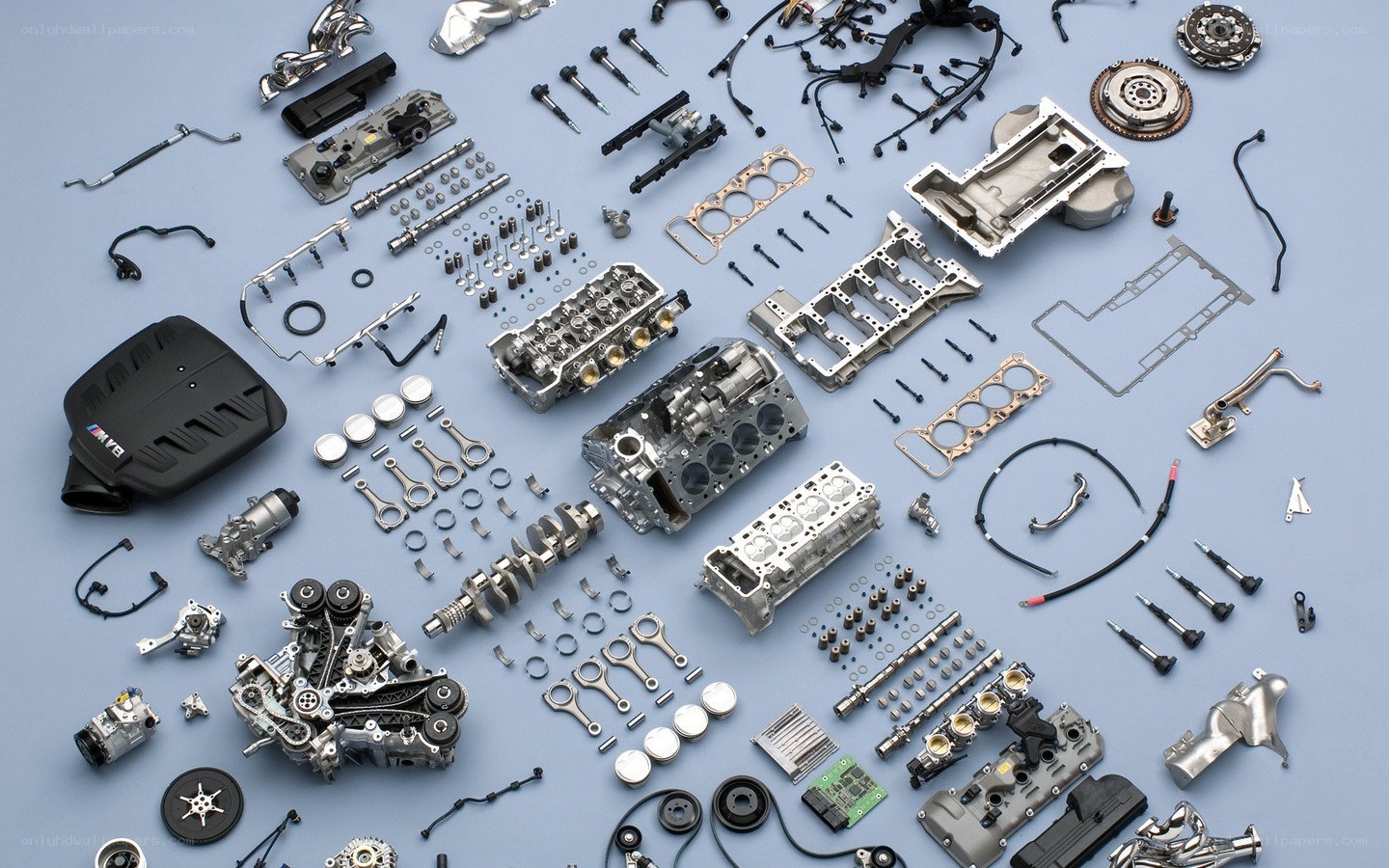 disassembled car engine parts