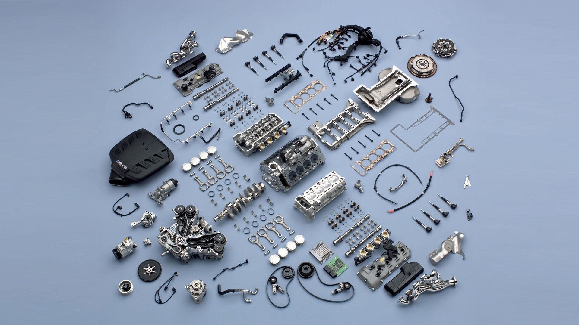 Disassembled car engine parts