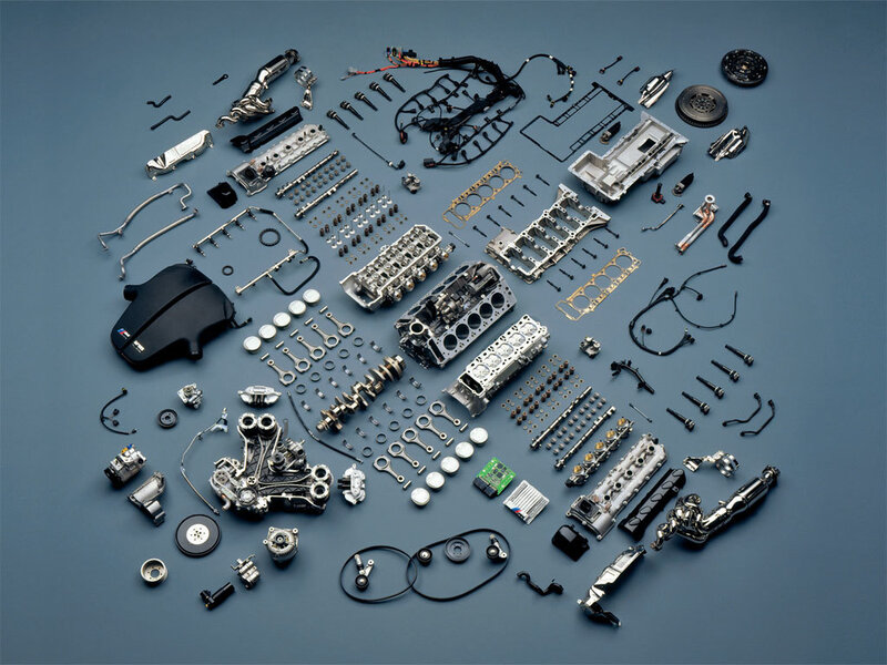 Disassembled car engine parts