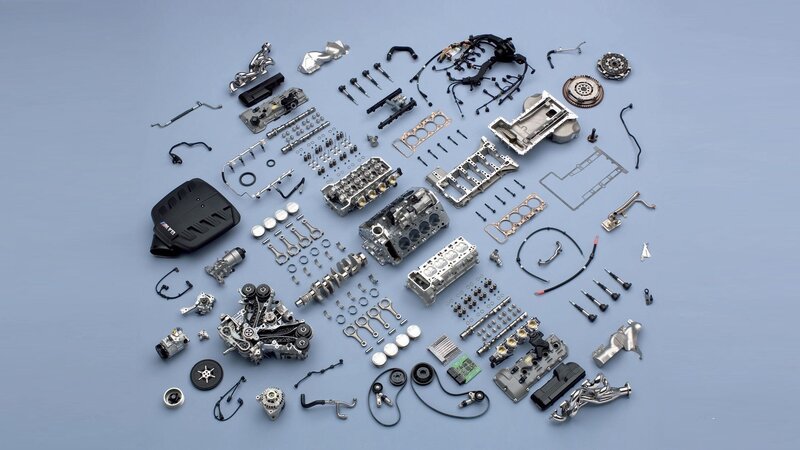 Disassembled Car Engine — Silver