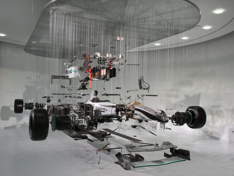 disassembled formula one car