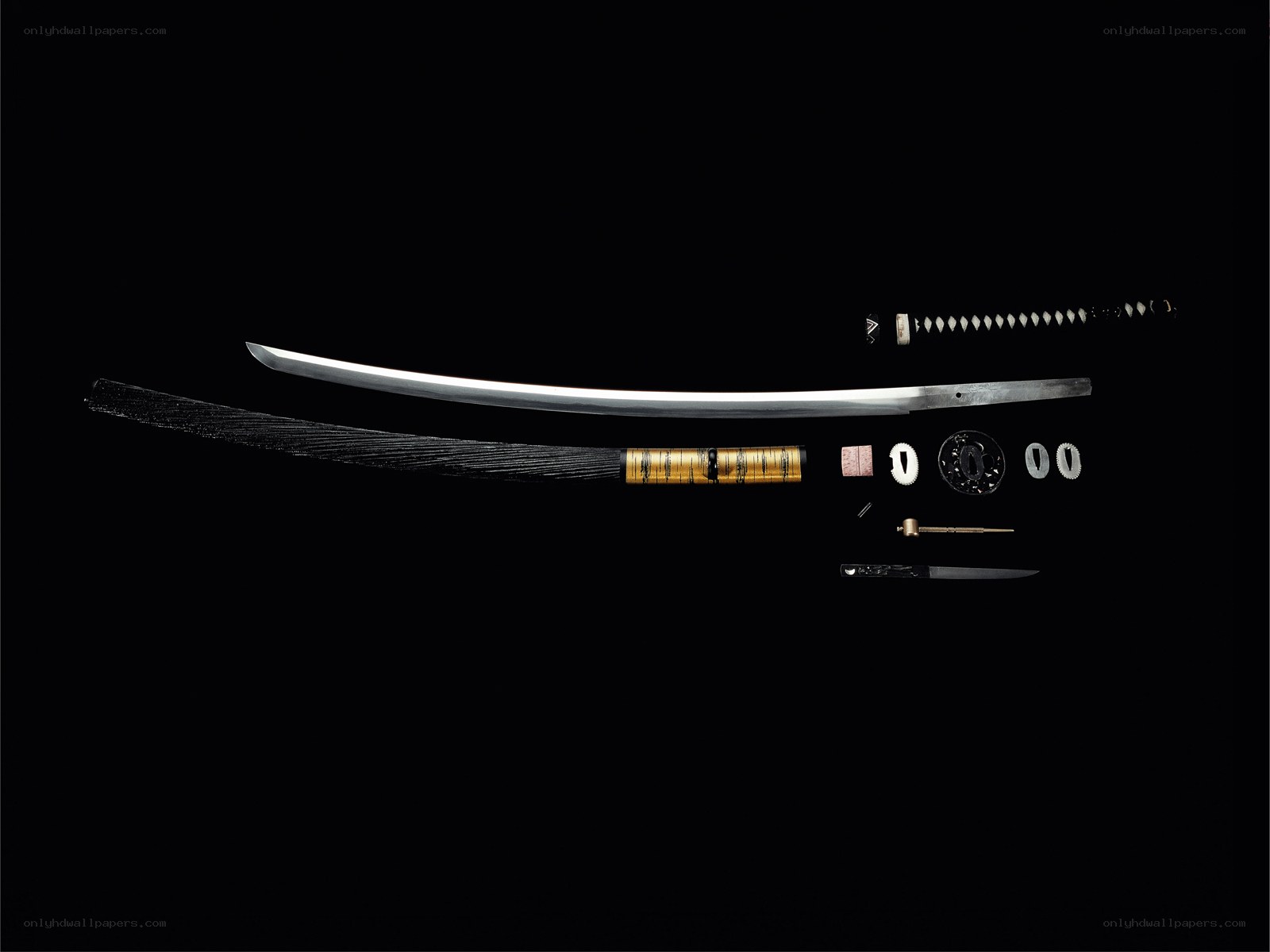 Disassembled Japanese sword components