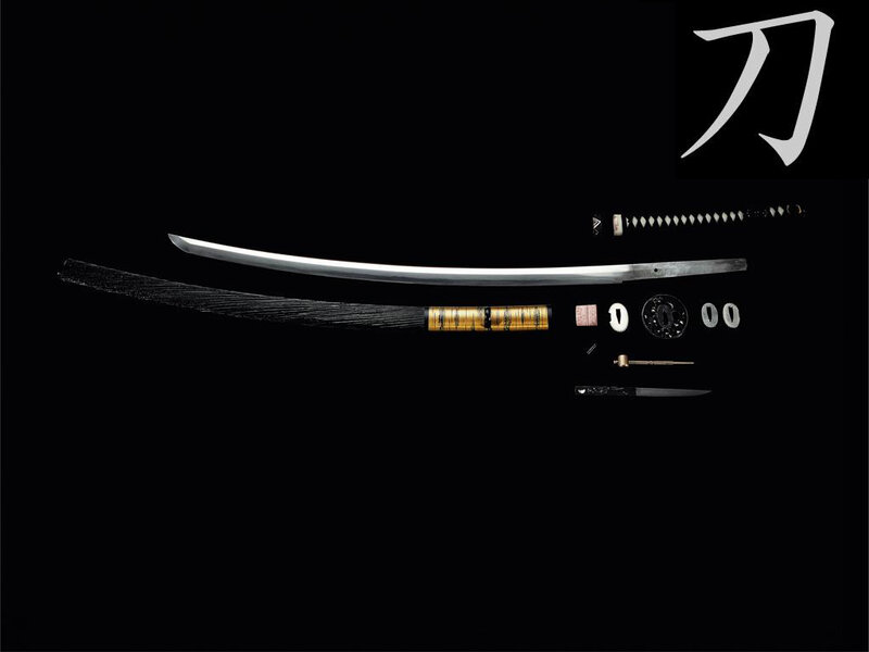 disassembled katana components