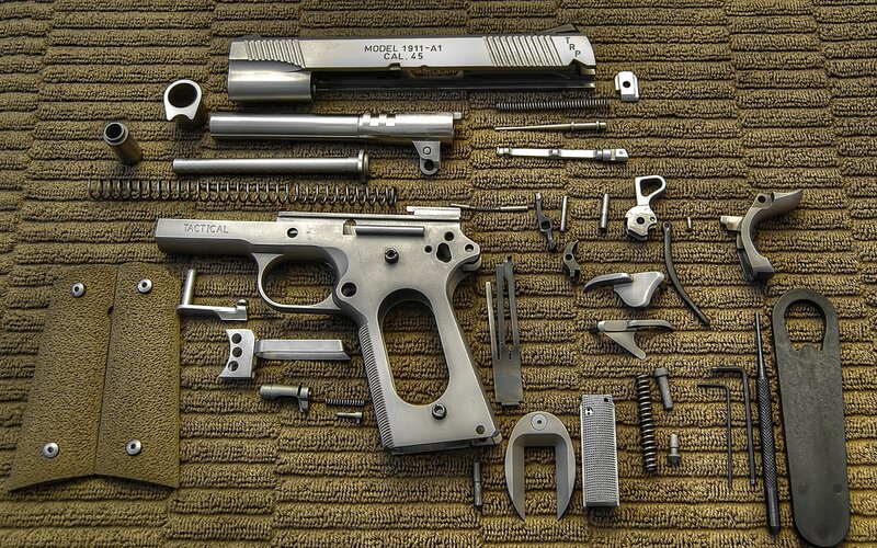Disassembled Pistol — Brown
