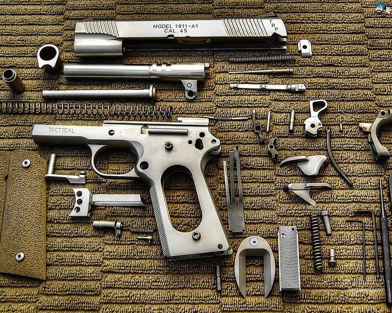 Disassembled pistol components