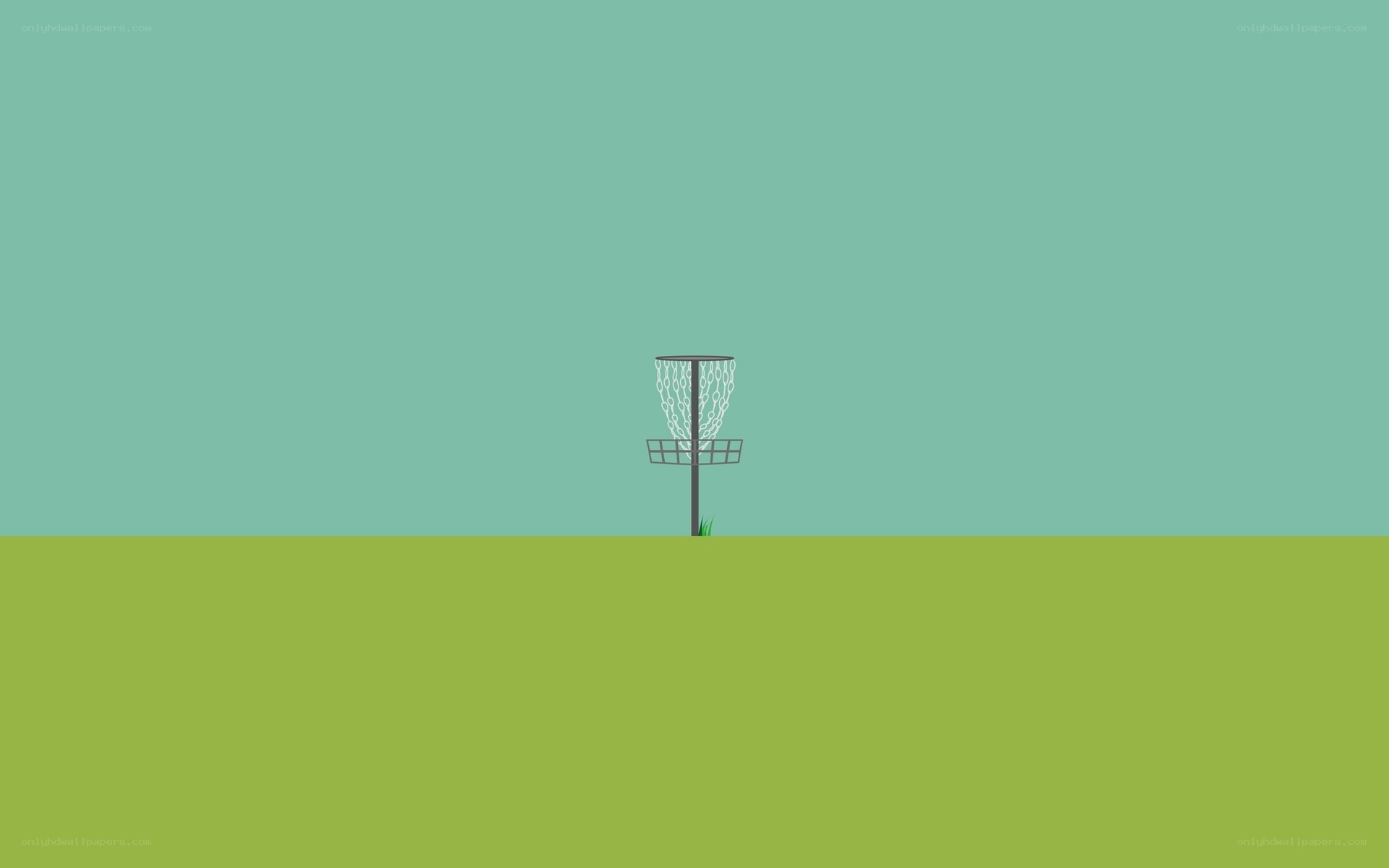 Disc golf basket on green field