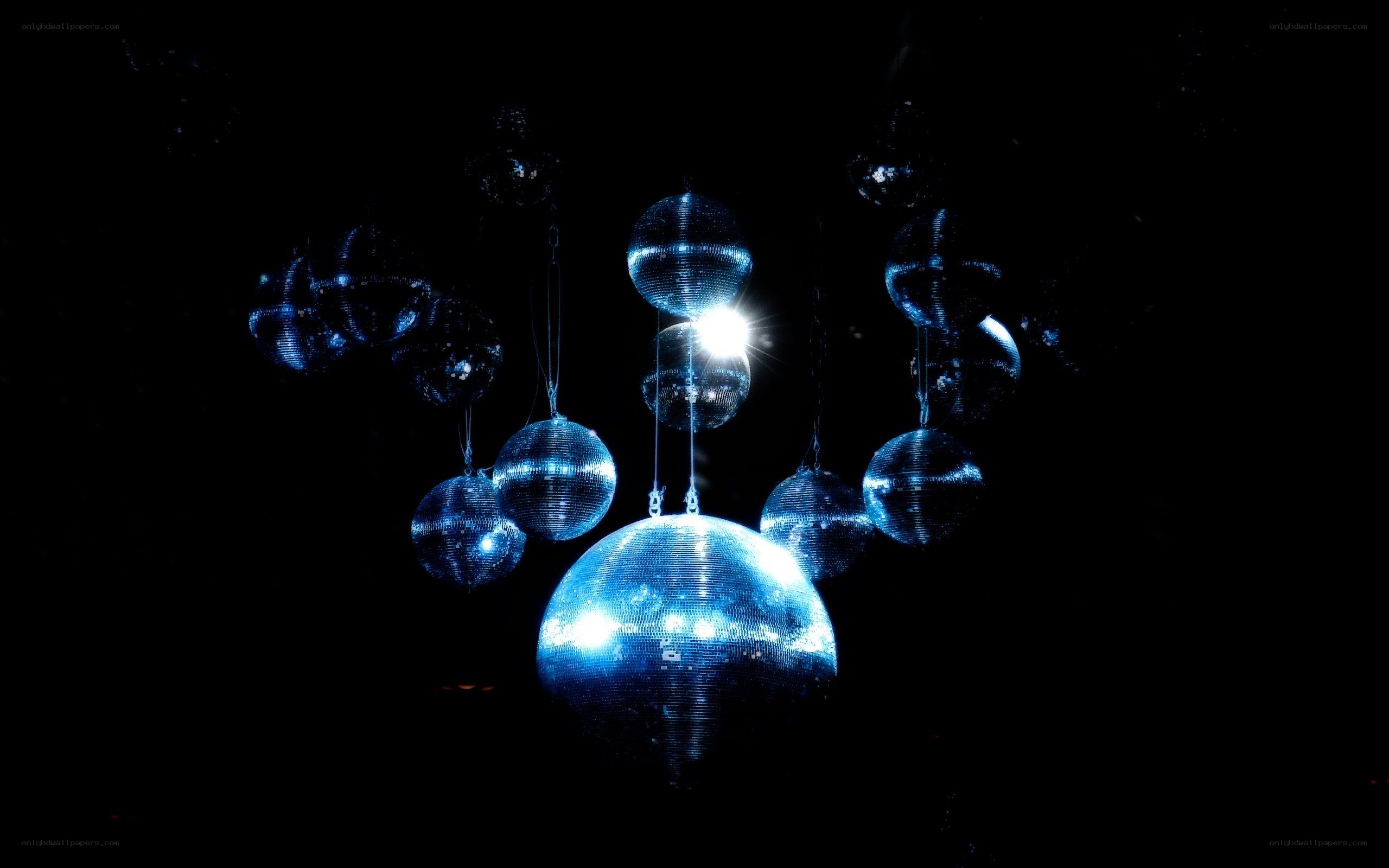 Disco balls in dark room