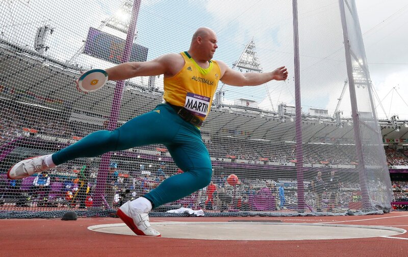 Discus throw athlete in action