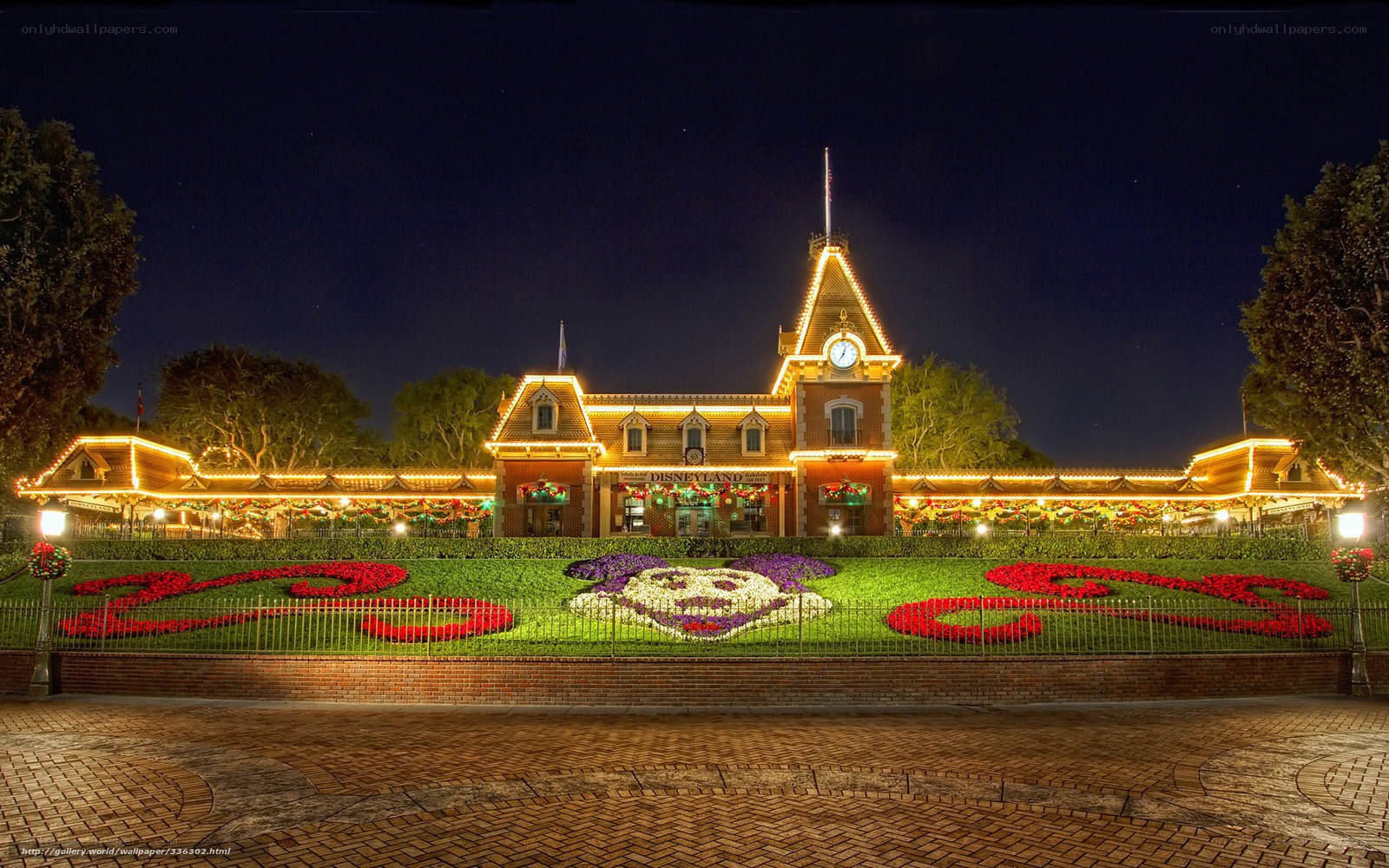 Disneyland entrance at night