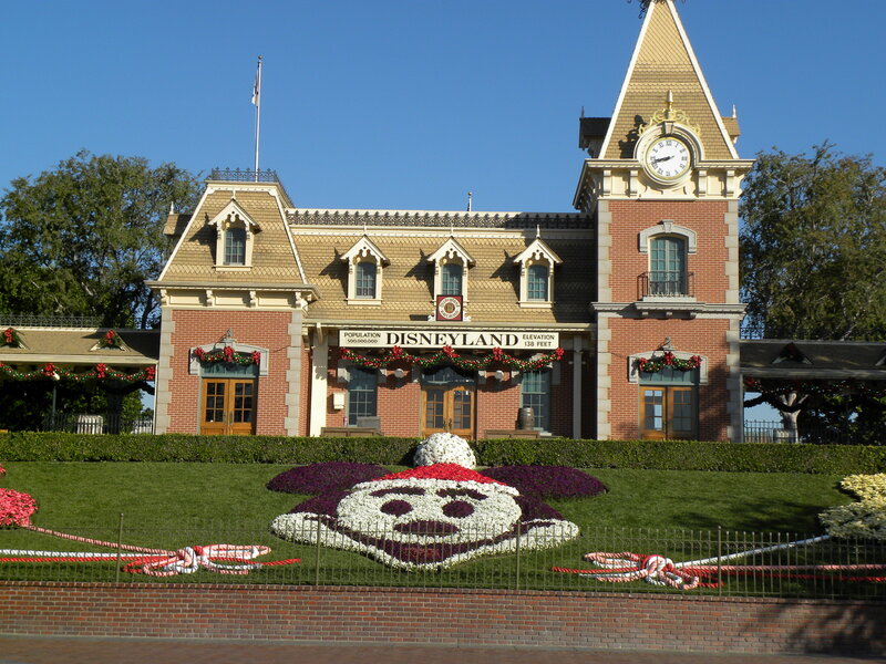Disneyland entrance with Mickey Mouse topiary