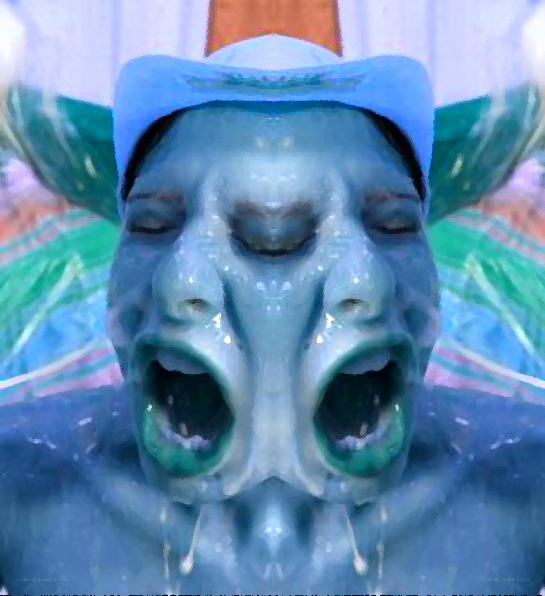 distorted creature with multiple mouths