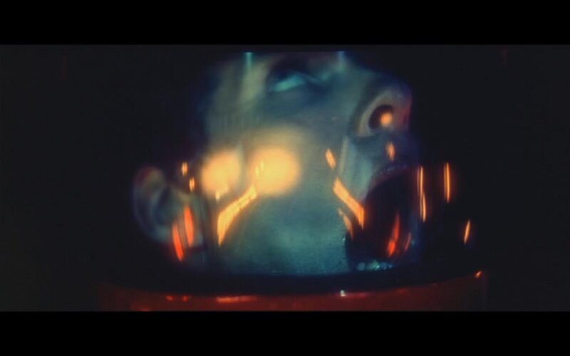 distorted face in dark scene