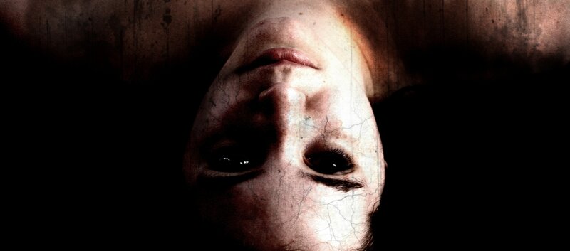 distorted face in dark setting
