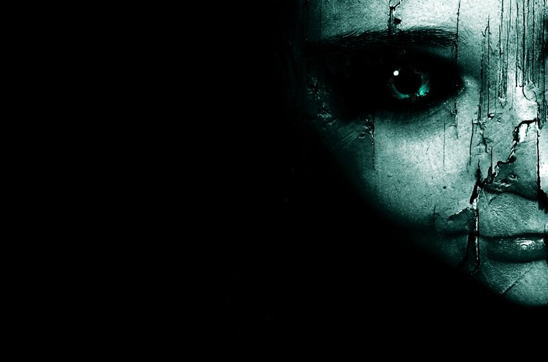 distorted face with glowing eye