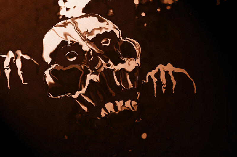 Distorted Skull and Hands