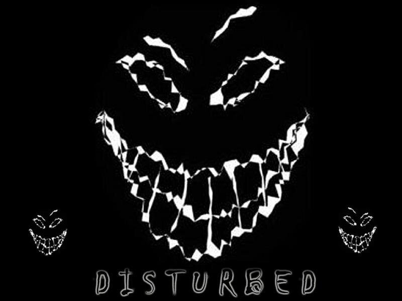 disturbed logo with grinning faces