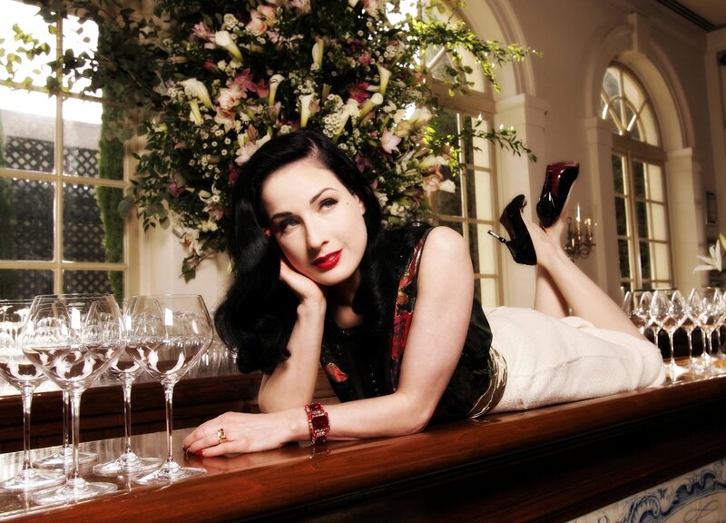 Dita Von Teese at a bar
