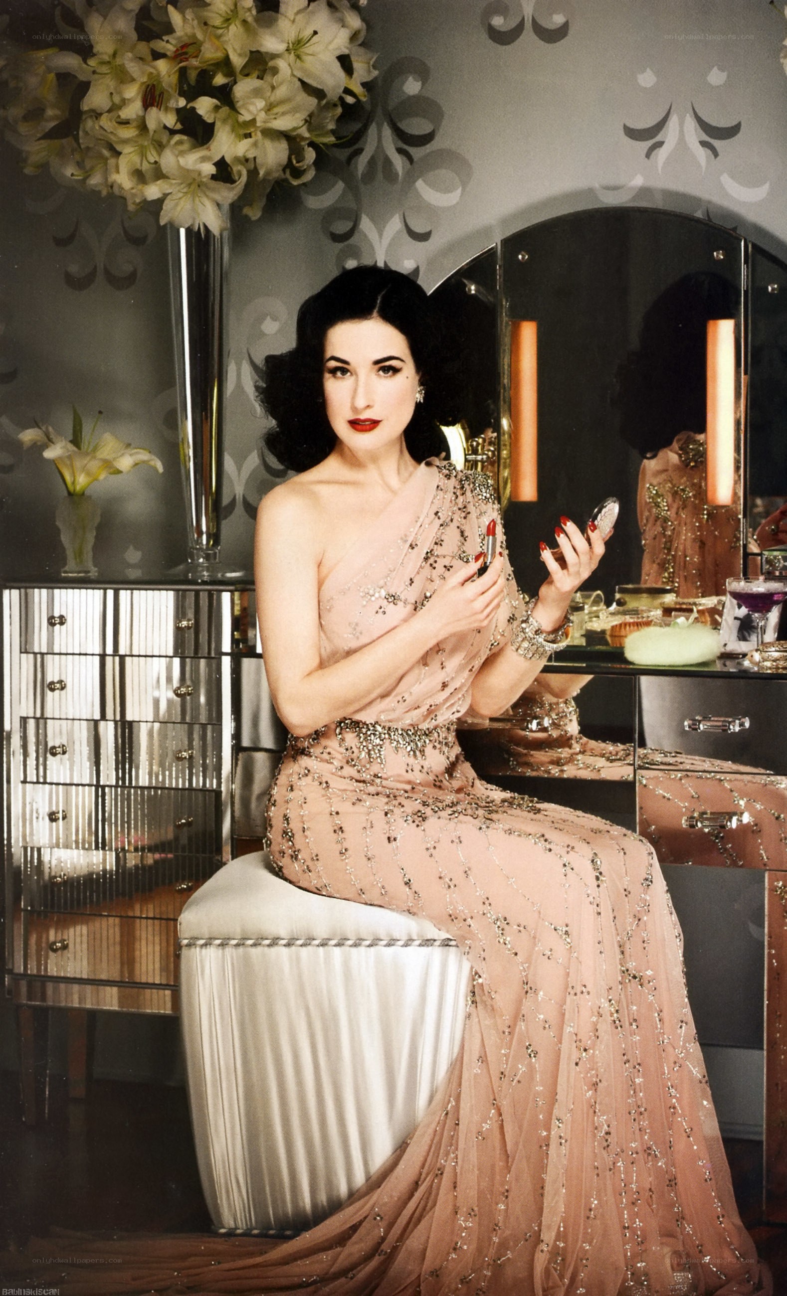 Dita Von Teese in a glamorous gown