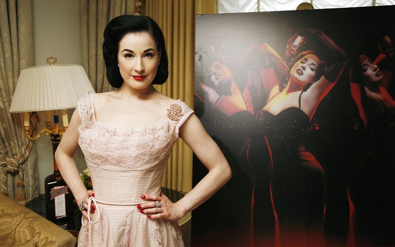 Dita Von Teese in a lace dress