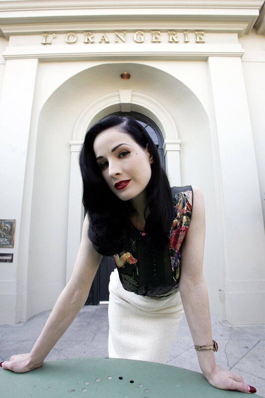 Dita Von Teese in front of L'Orangerie