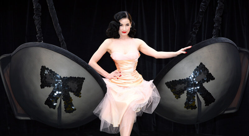 Dita Von Teese in peach dress