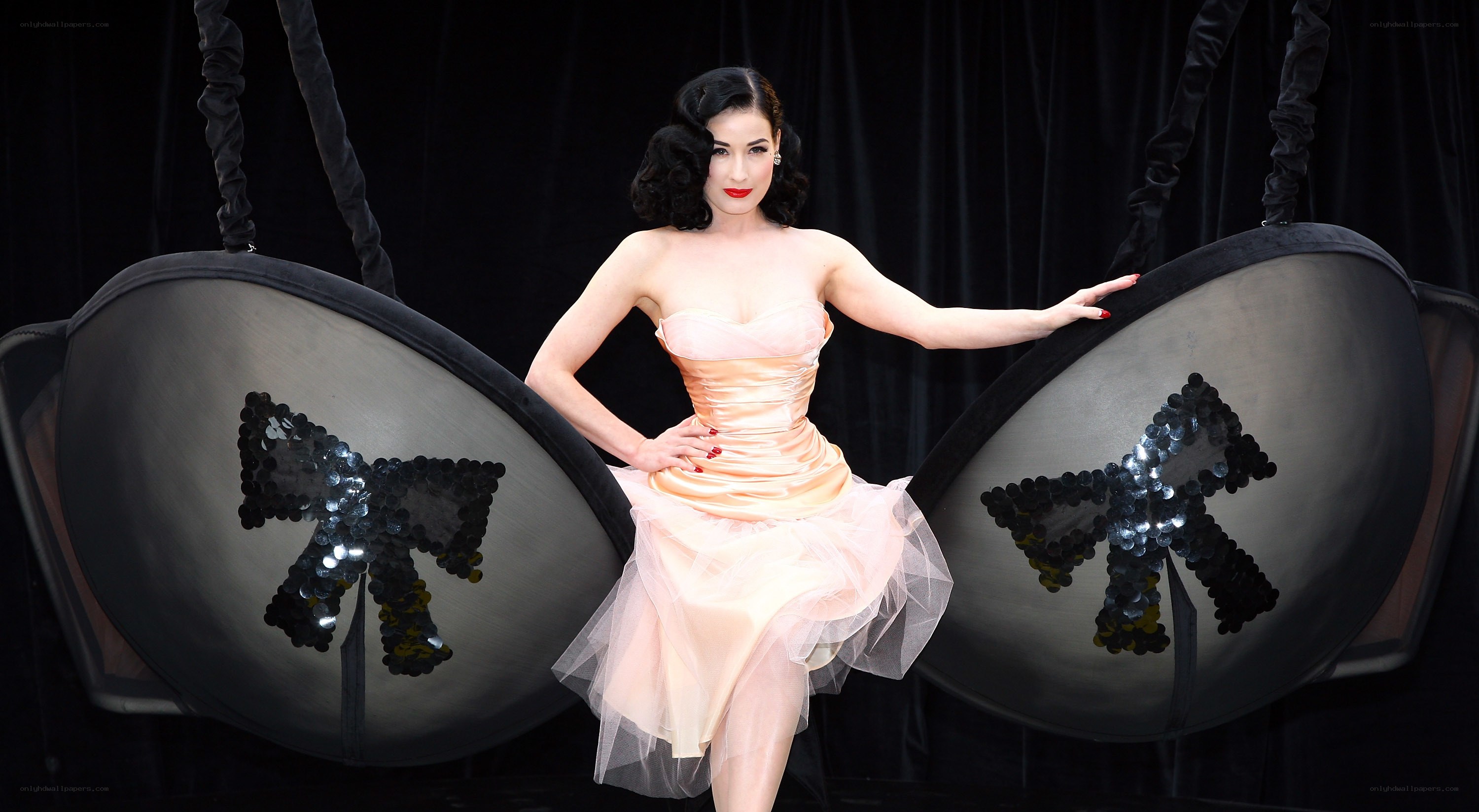 Dita Von Teese in peach dress