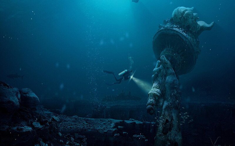 diver explores underwater ruins
