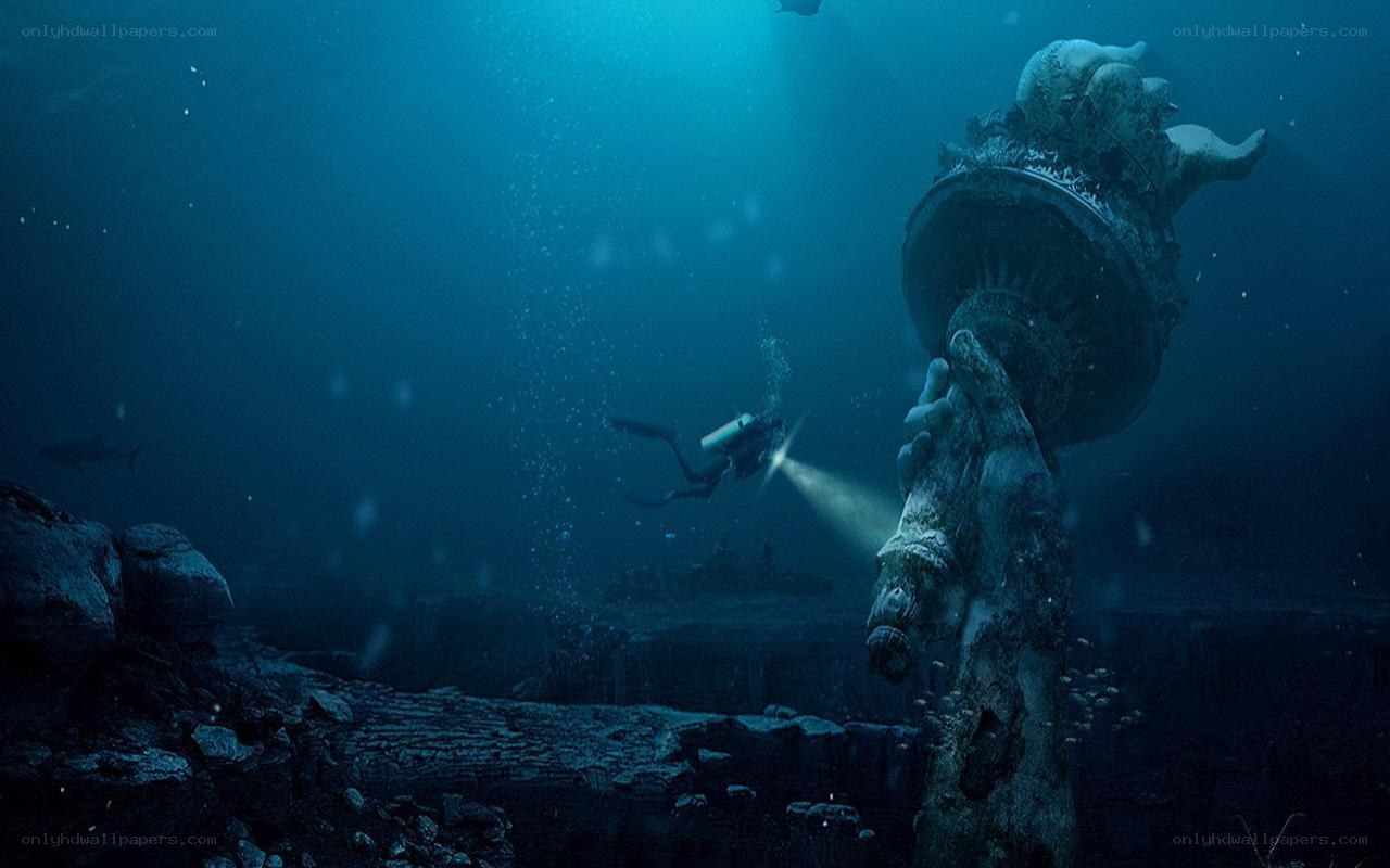 diver explores underwater ruins