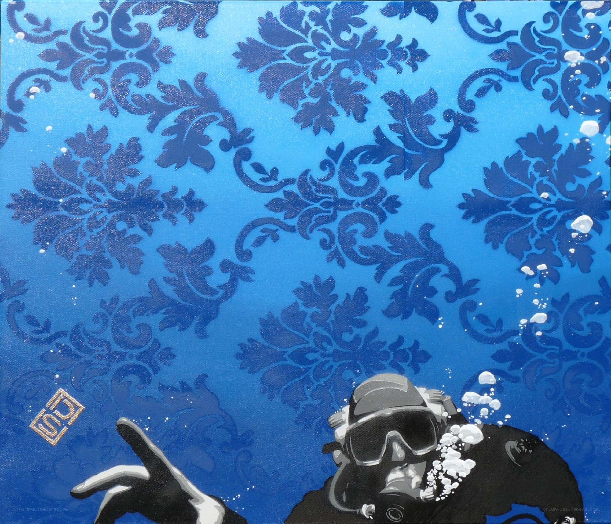 Diver in blue patterned water