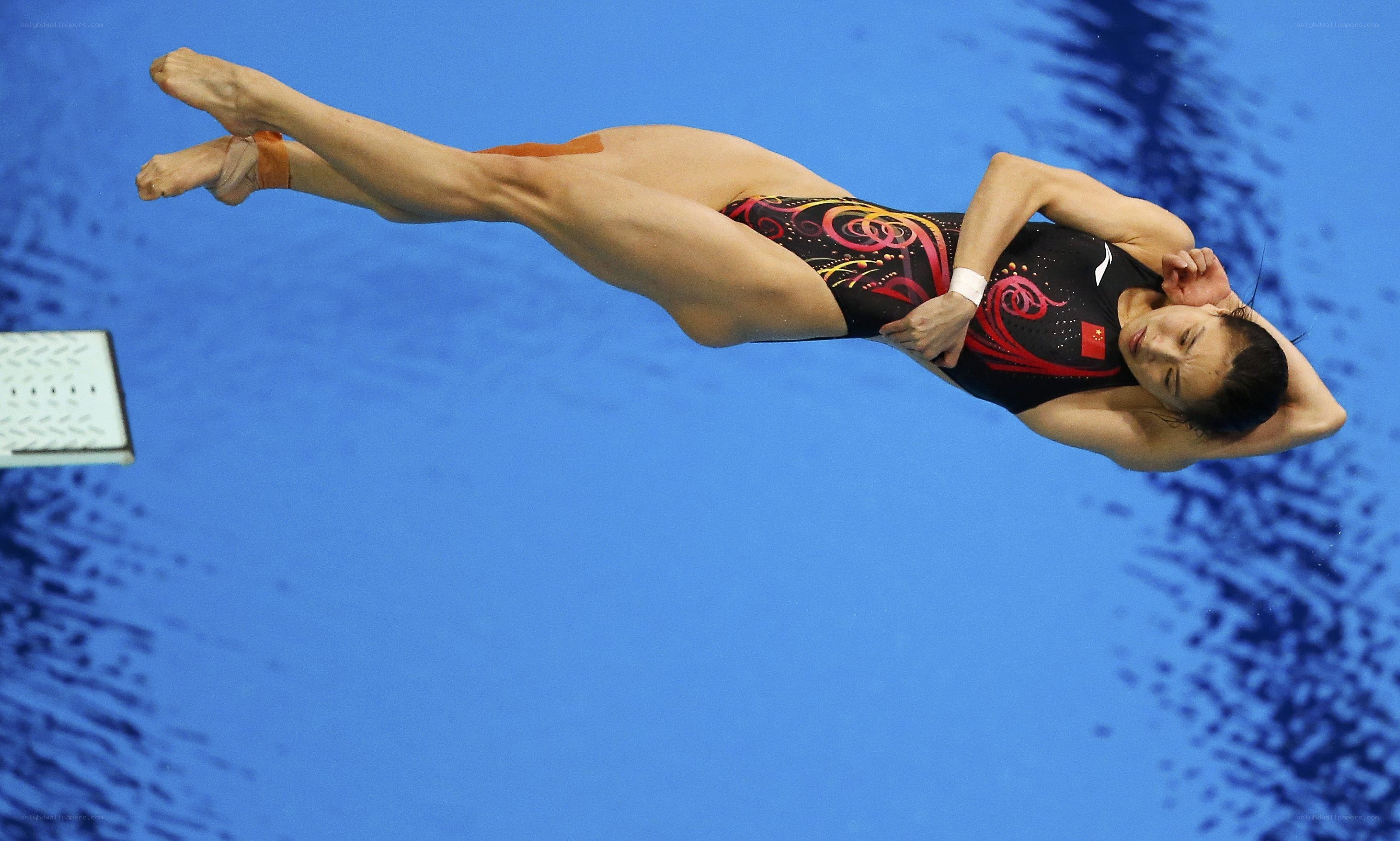 diver in mid-air dive