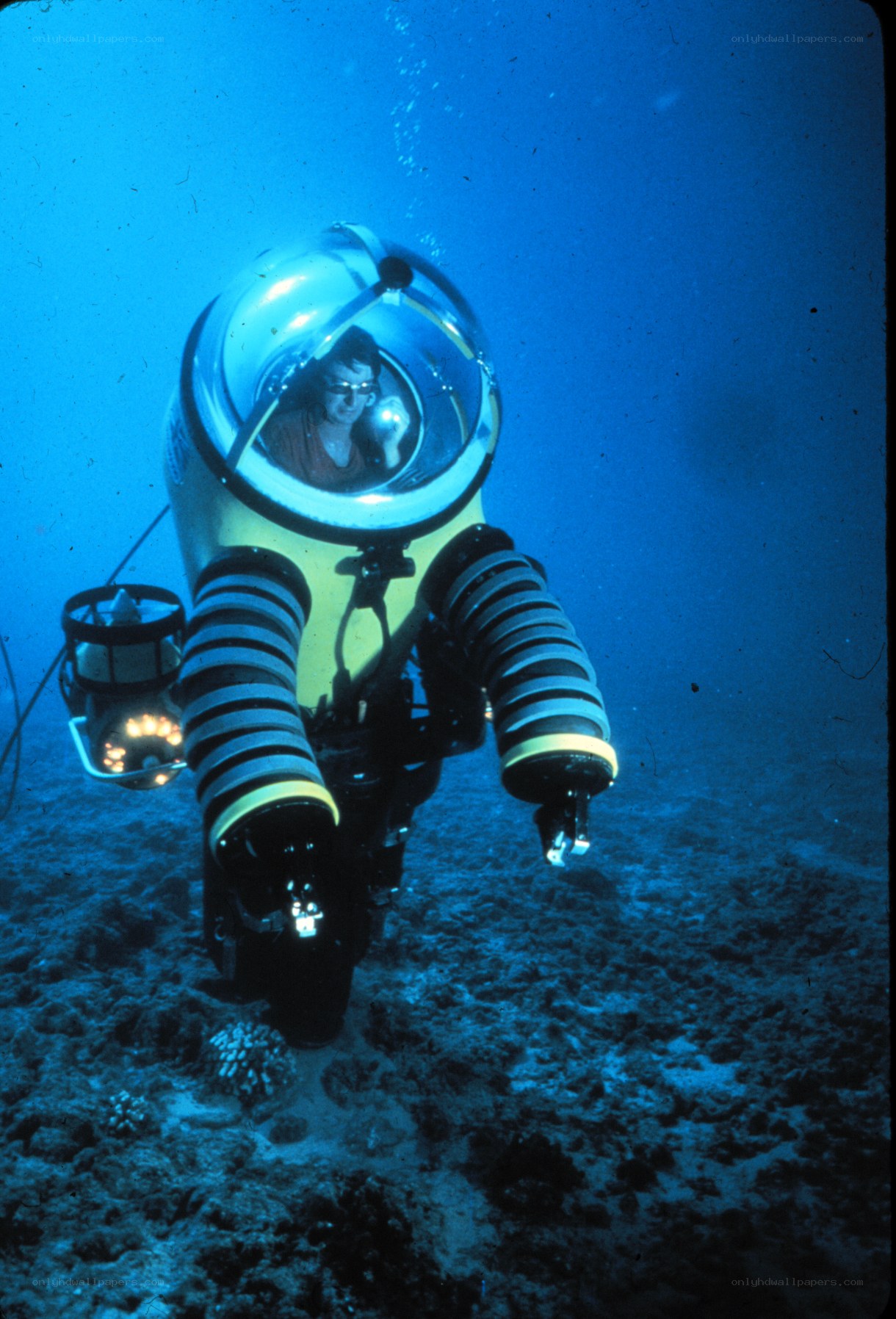 diver in submersible vehicle