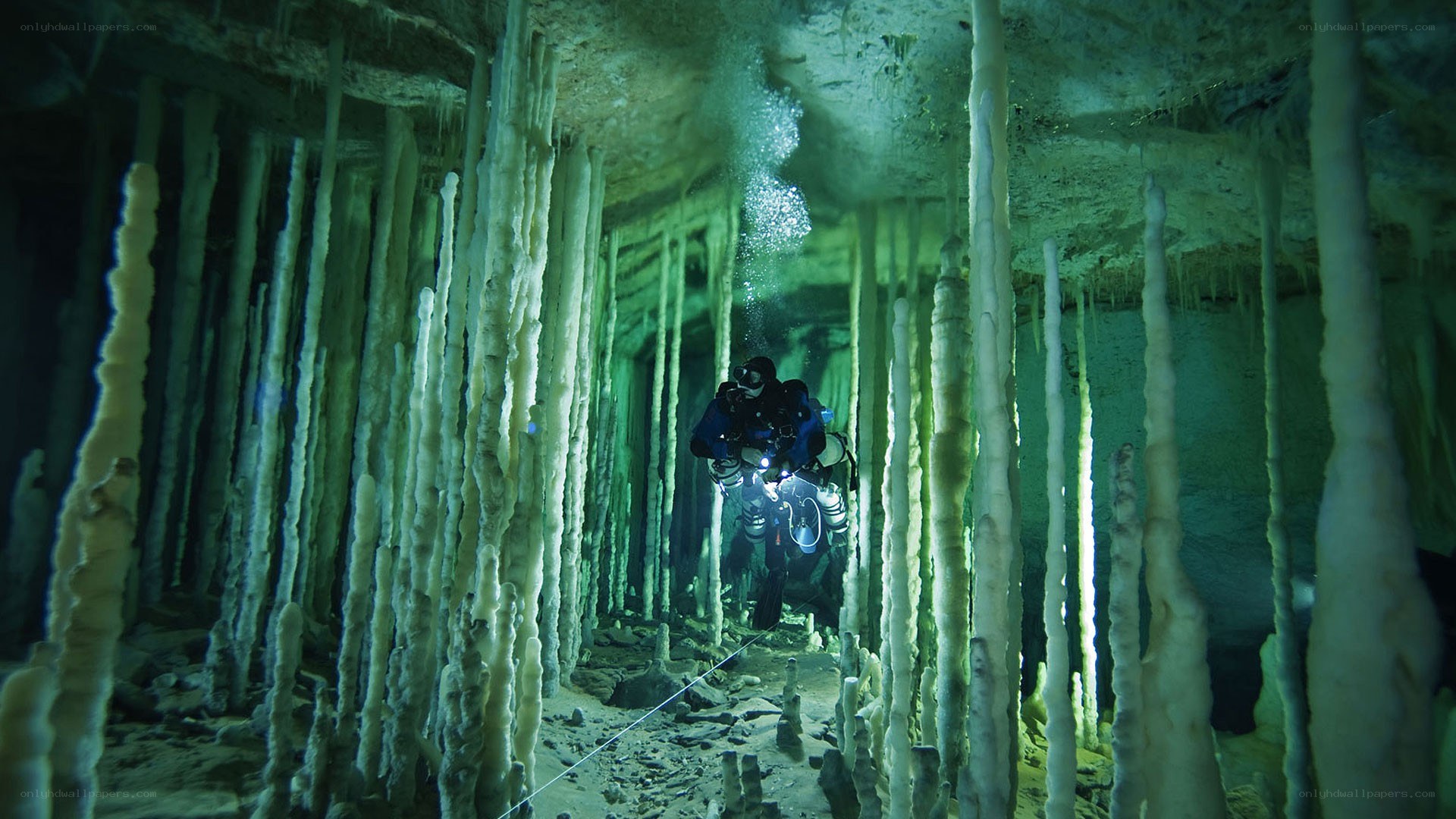 Diver in underwater cave