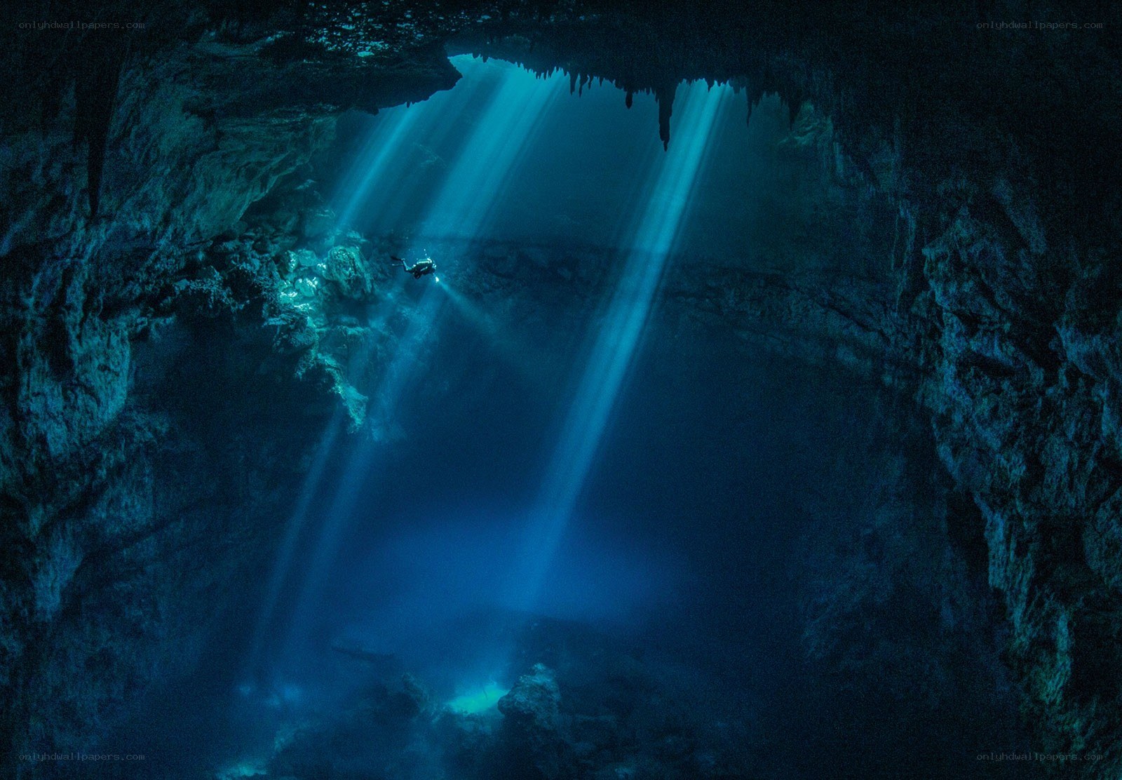 Diver in underwater cave