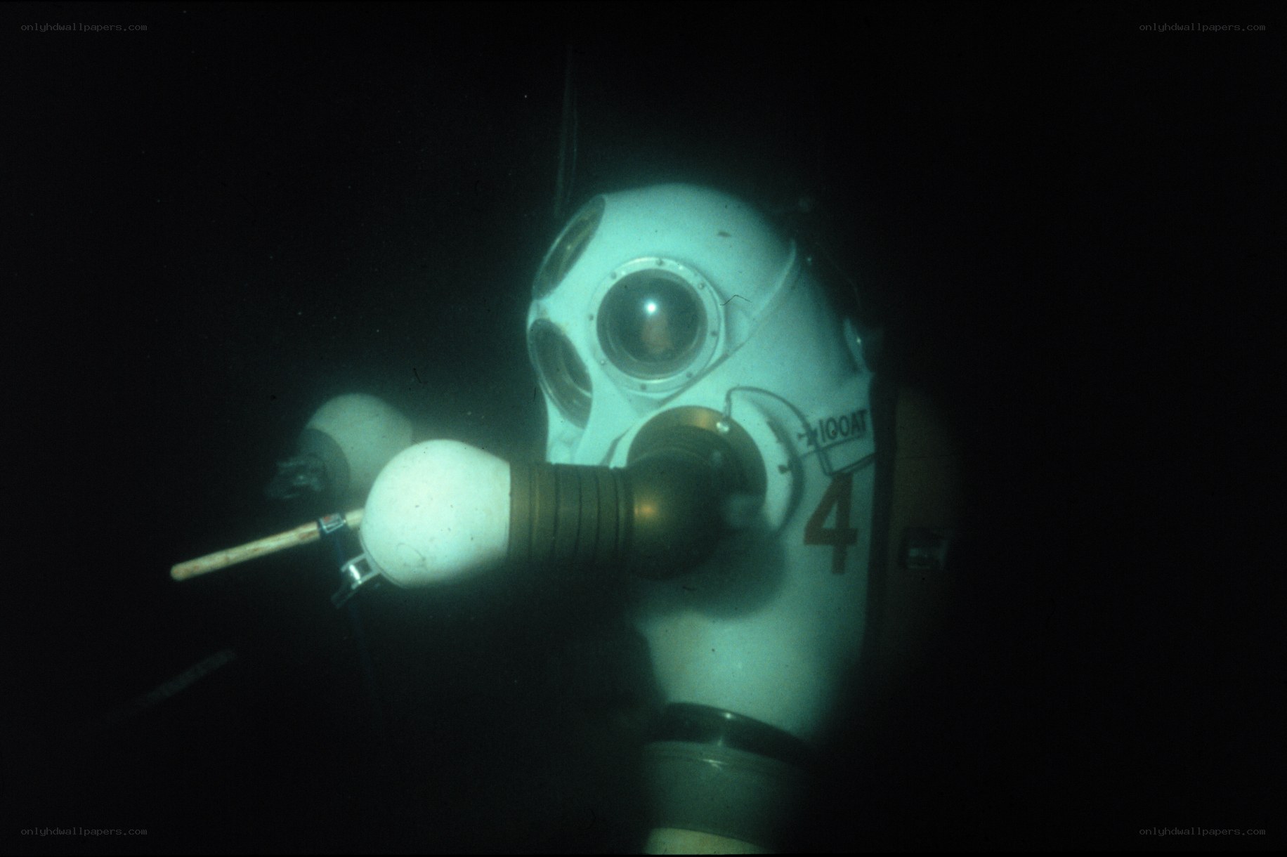 diver in underwater helmet