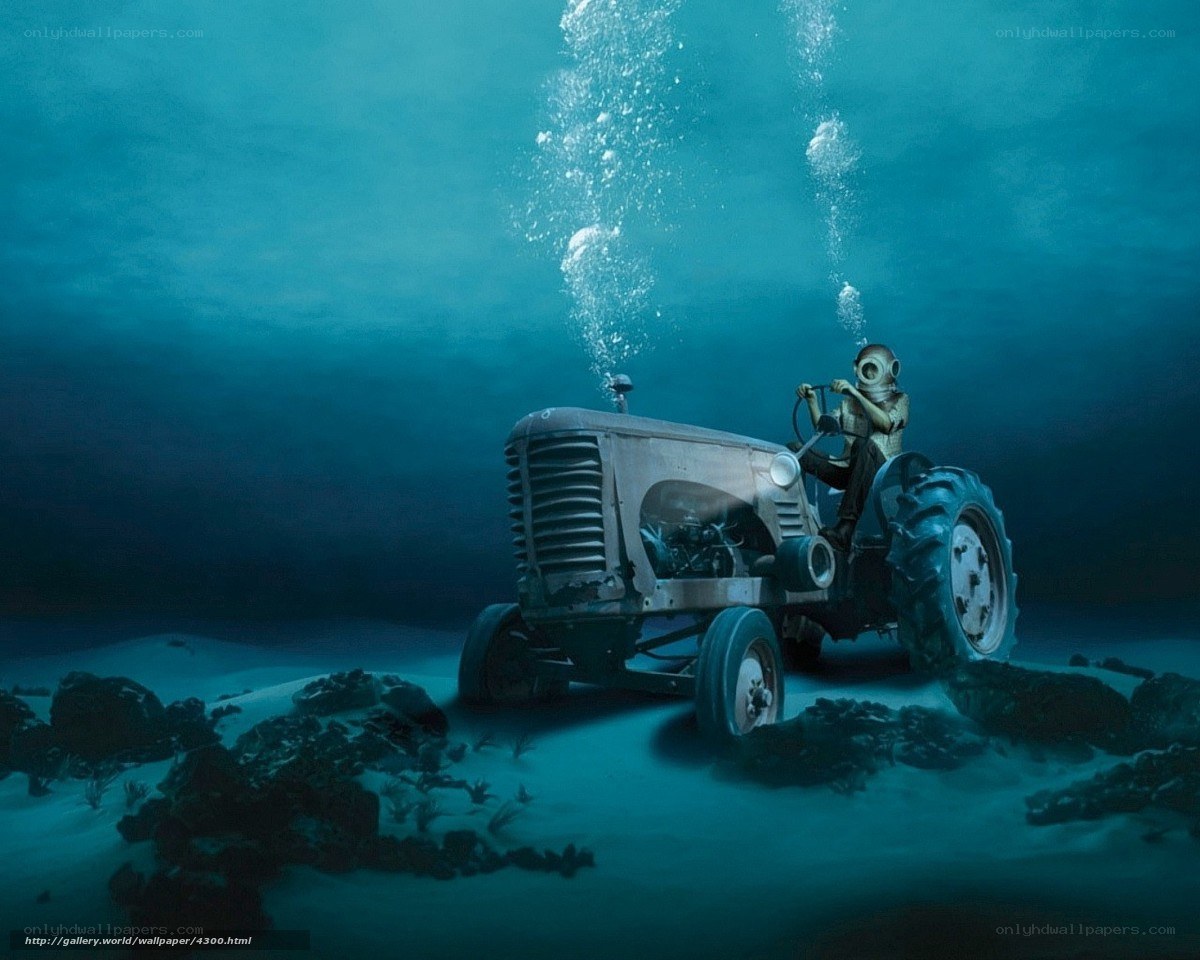 diver on tractor underwater