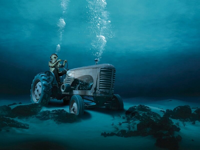 diver on underwater tractor