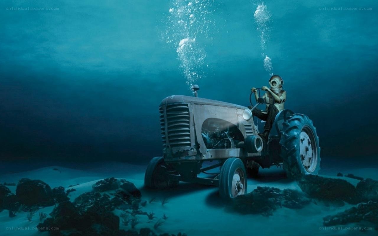 diver on underwater tractor