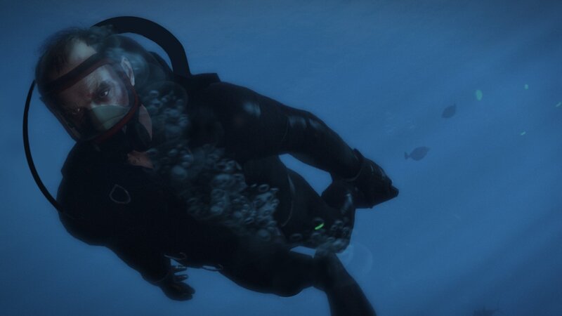 diver underwater in blue water