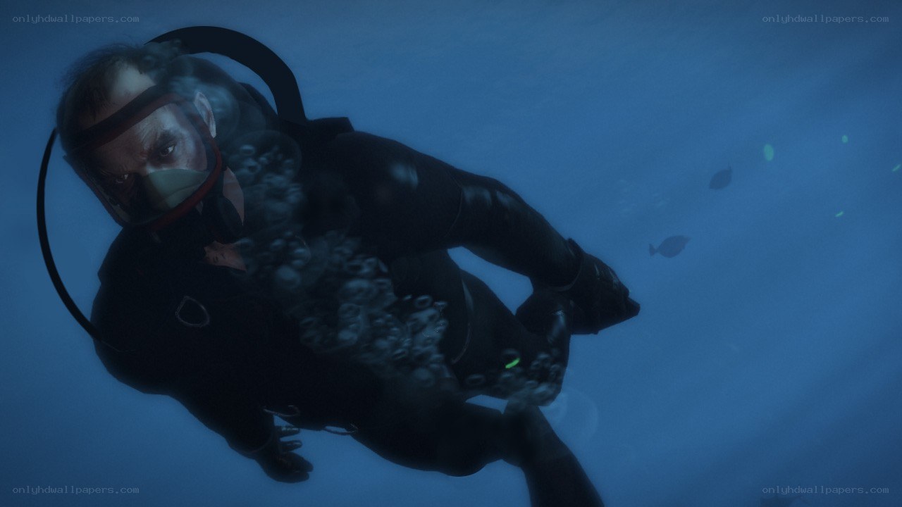 diver underwater in blue water