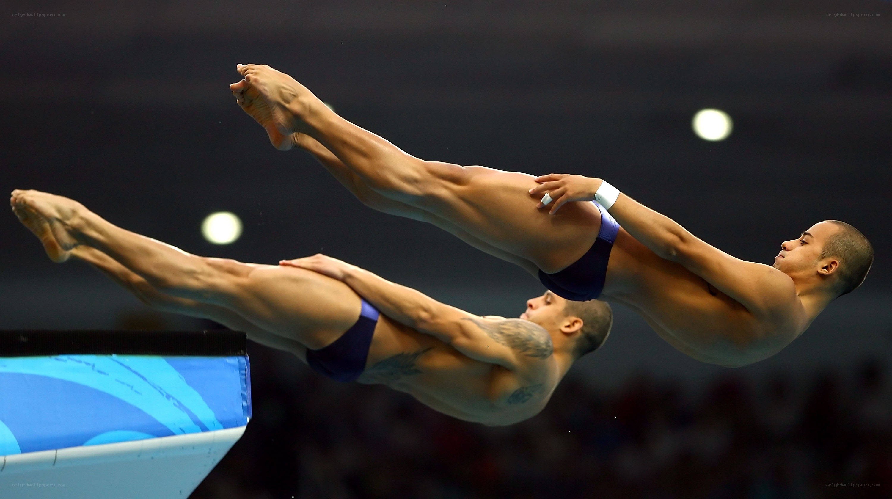 Divers in mid-air