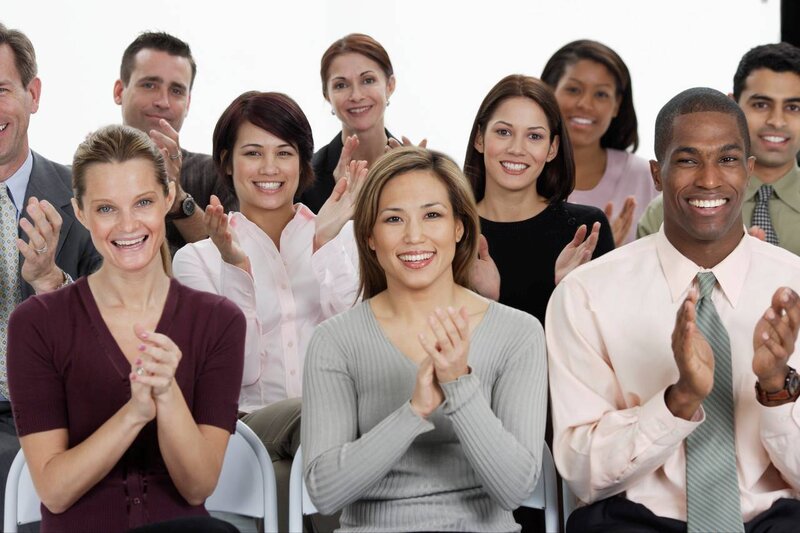 diverse business people applauding
