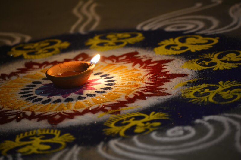 Diya on Rangoli