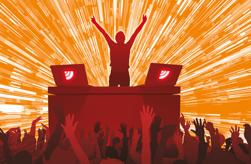 DJ at a concert with crowd