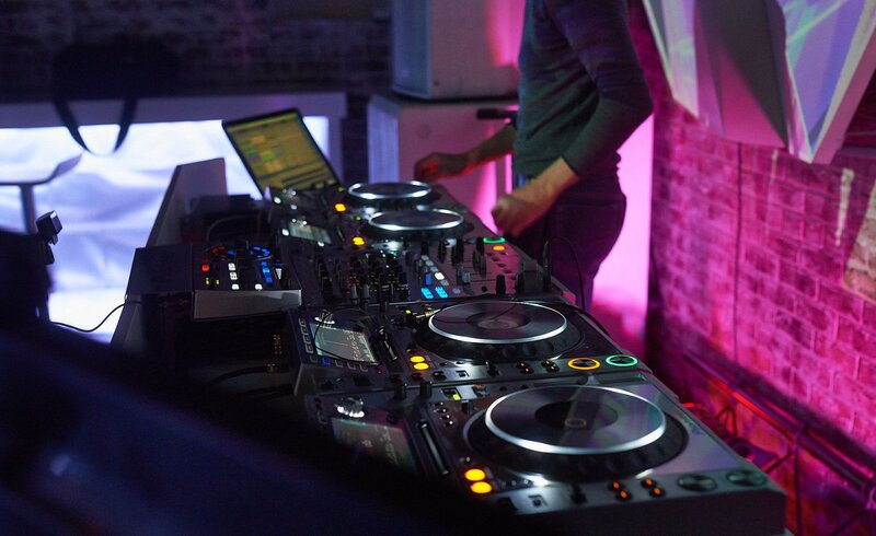 DJ at Turntable Setup — Purple